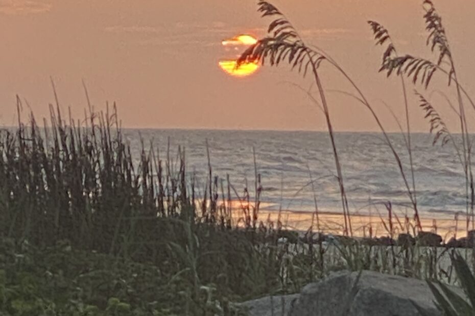 Parkinson's Challenges - a photo of the beach at sunrise to emphasize a new day